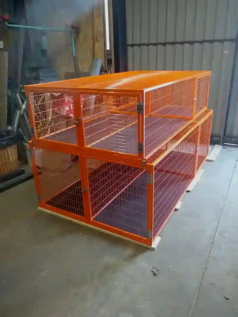 Custom metalwork zinc primed and powder coated in orange, finished at Powderplus Ltd